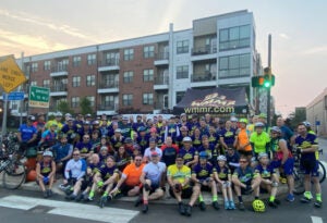 Group shot at the starting line at the base of the Ben Franklin Bridge in Philadelphia.