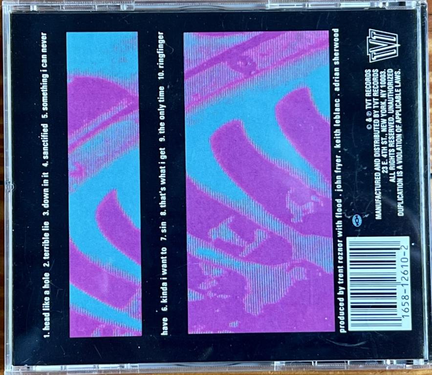 A picture of the back cover of Nine Inch Nails debut album 'Pretty Hate Machine'