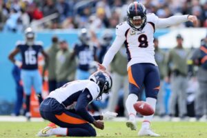 NASHVILLE, TENNESSEE - NOVEMBER 13: Brandon McManus #8 of the Denver Broncos kicks a field goal during the second quarter against the Tennessee Titans at Nissan Stadium on November 13, 2022 in Nashville, Tennessee.