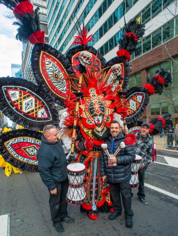 Jacky BamBam presents first place winner JUNGLE EXOTICA at the Mummers Parade 2024. He is posing with Sam Regalbuto, president of the String Band Association.