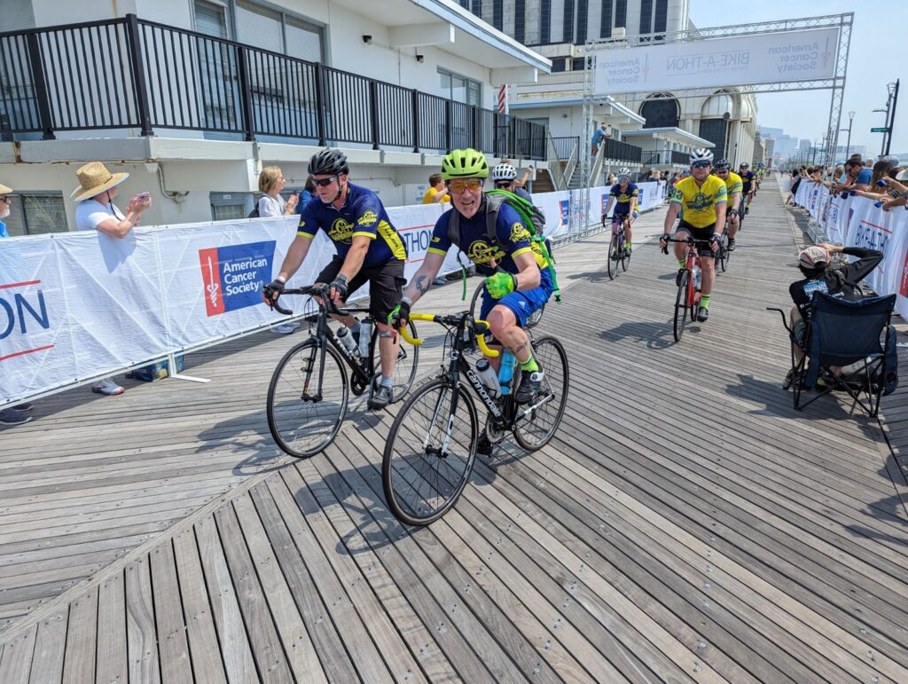 Markus Goldman and Vince Strausser Riding onto the Boardwalk in Atlantic City at The Endpoint for Bikeathon.