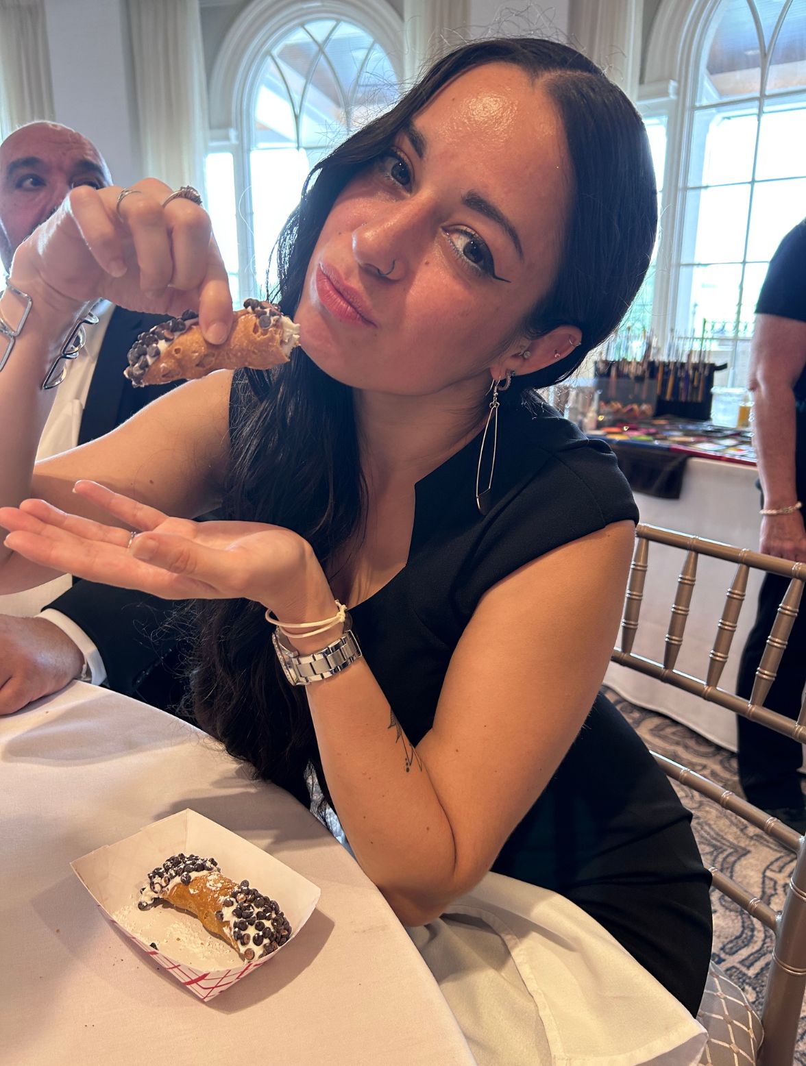 Brittany holding a cannoli