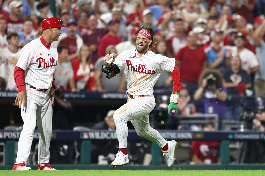 Bryson Stott of the Philadelphia Phillies throws to first base News  Photo - Getty Images