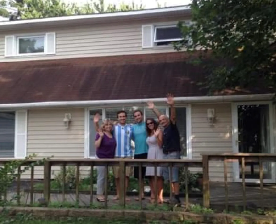 Kathy Romano's family on the porch of her childhood home