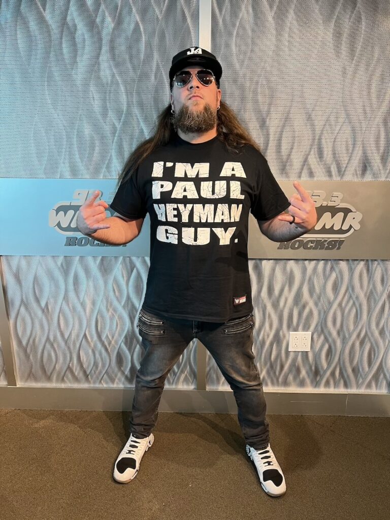 Brent Porche wearing a shirt that says "I'm a Paul Heyman Guy"