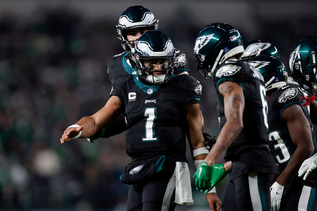 PHILADELPHIA, PENNSYLVANIA - DECEMBER 25: Jalen Hurts #1 and DeVonta Smith #6 of the Philadelphia Eagles celebrate a touchdown during the second quarter against the New York Giants at Lincoln Financial Field on December 25, 2023 in Philadelphia, Pennsylvania.