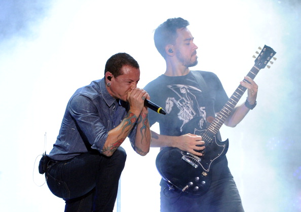 Singer Chester Bennington (L) and musician Mike Shinoda of Linkin Park perform onstage 