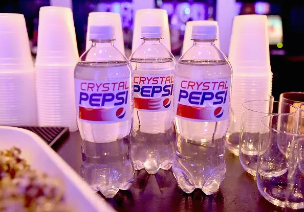 Three bottles of Crystal Pepsi as part of a review of throwback foods